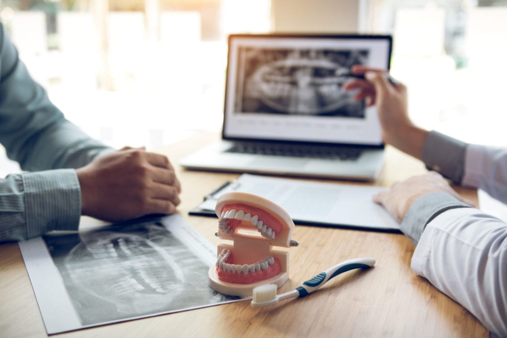 Dental Implants vs Dentures in Nashville TN